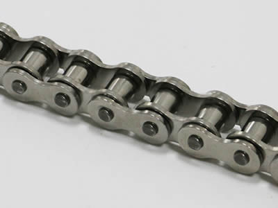 A piece of single pitch stainless steel single pitch roller chain on the white background.