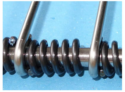 An eye flex conveyor belts EBSS with springs as spacers